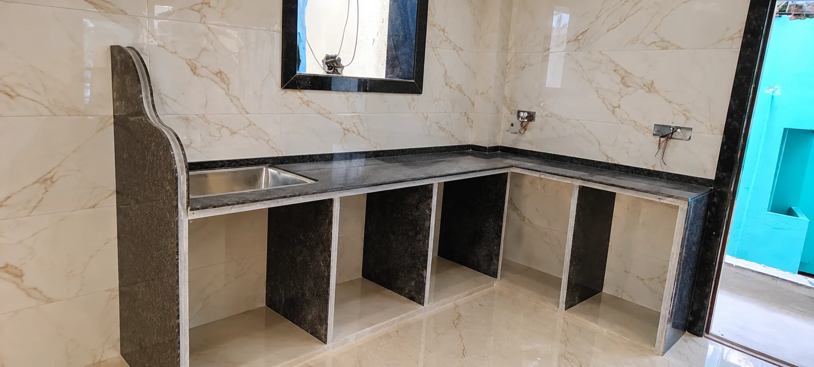 Marble-tiled kitchen